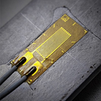 Foil Strain Gauge Bonded to a Metal Surface